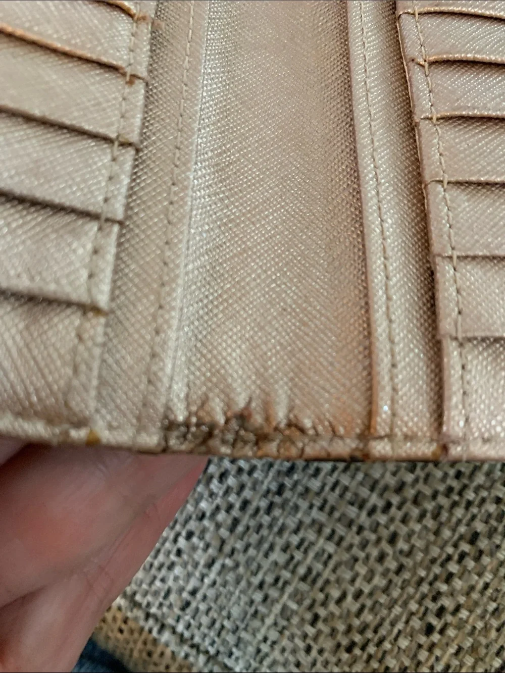 Kate Spade rose gold wallet with callouts
